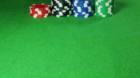 Man moves stacks of poker chips Stock Footage 58744038