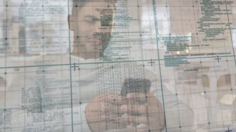 Man moving to center while tapping phone, causing transparent code grid overlay Stock Footage 334039100