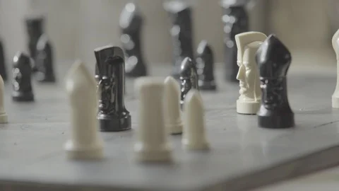 Man Moving Chess piece on board Stock Footage 91152868