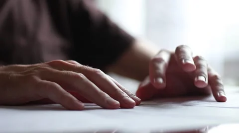 Man moving with fingers on a table Stock Footage 63454658