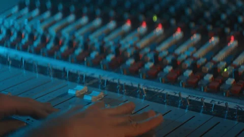 Man moving knobs during a soundcheck Stock Footage 149130489
