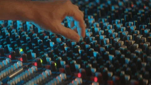 Man moving knobs during a soundcheck Stock Footage 149130691