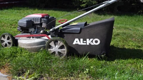 Man mowing the grass, 11 September 2021, Ternopil, Ukraine Stock Footage 165552706
