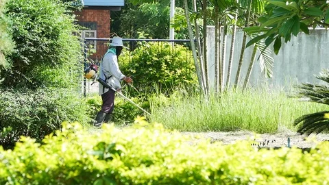 Man mowing a lawn Video stock 111330548