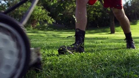 Man Mowing Lawn Grass Yard Working Landscape 4K Stock Video Footage Stockbeeldmateriaal 77327193