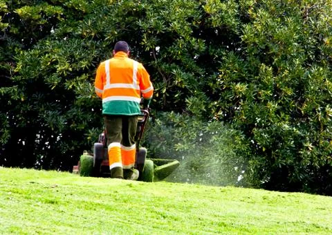 Man mowing Stock Photos
