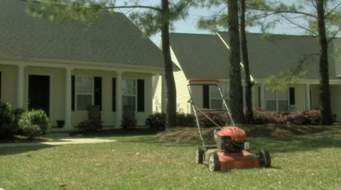 A Man Mows Stock Footage 698957