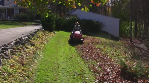 Man mows lawn 3 Stock Footage 33313867