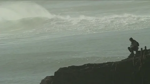 Man with music and waves Stock Footage 77051676