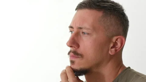 A man with a mustache and beard is working and thinking Stock Footage 251607171