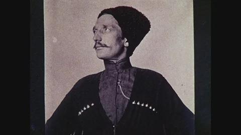 Man, mustache, fur hat, old turn of the century black and white photo of Video stock 82562560