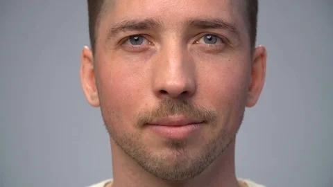 Man with mustache looking straight Stock Footage 70484498