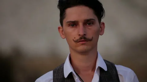 Man with mustache looking at you Stock Footage 56299864