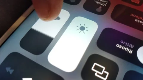 Man mute iphone volume from the setting. iphone setting for turn off volume. Stock Footage 242983847