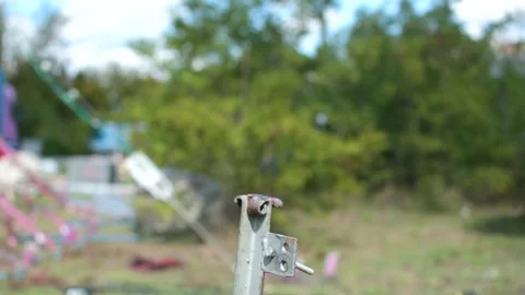 A man nails in a spike with a big hammer. Stock Footage 248673280