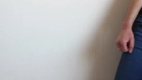 A man with a naked torso imitates playing the guitar. Stock Footage 130638215