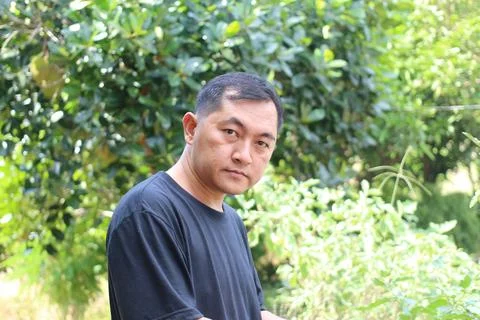 Man in Nature with Greenery Background Foto stock