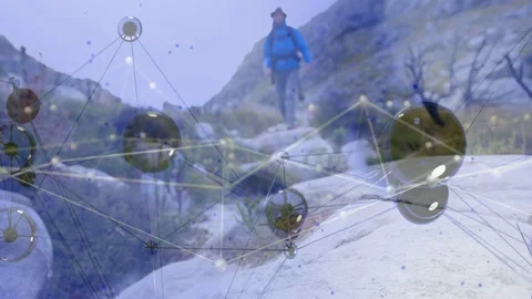 Man navigating canyon path, approaching camera and causing tech network nodes Stock Footage 333368466