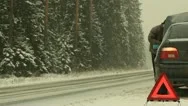Man Near Broken Car In Snow Storm Stock Footage