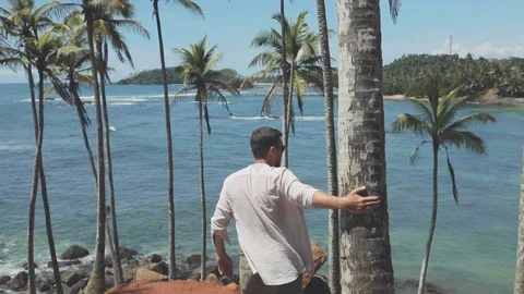 Man near palm tree Video stock 109422286
