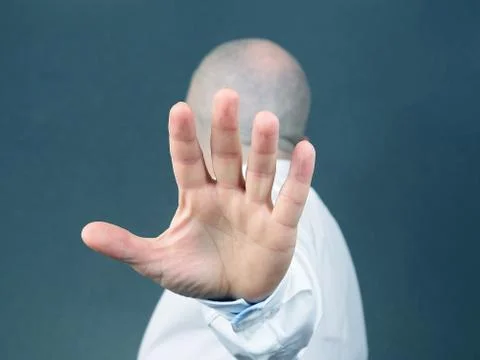 Man negative hand gesture and turned away Stock Photos