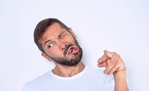 Man with nervous system problem. Man with facial nerve disorder Stock Photos
