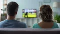Man nervously switching channels, poor quality of digital smart tv connection 4k or 4k+ Resolution