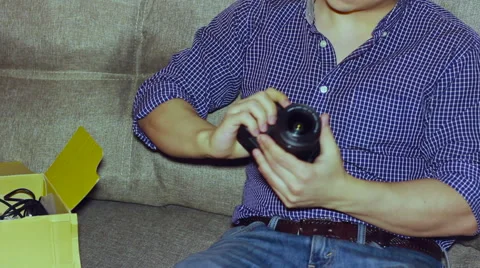 Man with new camera enjoying Stock Footage 60231249