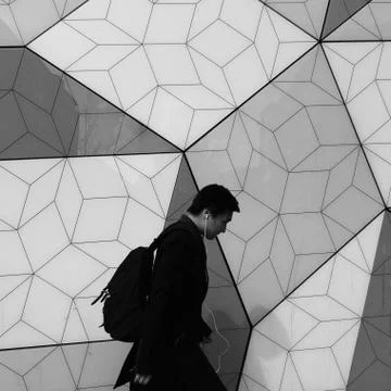 Man Next To Geometric Pattern Stock Photos