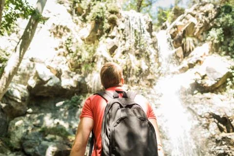 Man next to the waterfall Stock Photos