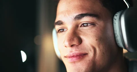 Man, night and headphones for coding on computer in office, software developer Stock Footage 301368501