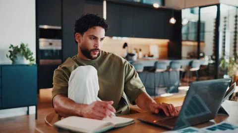 Man, notebook and remote work in home with laptop, data analytics and revie.. Stock Photos