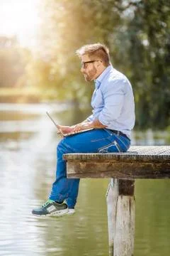 Man notebook outdoor Stock Photos