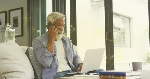 Man noticing smartphone ringing with UI icon and answering business call while Stock Footage 320506263