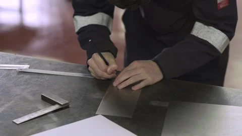 Man Noting Measurements With Ruler Vídeo Stock 151556541