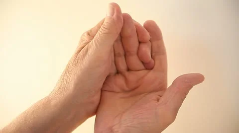 Man with numb fingertips Stock Footage 12580001