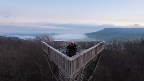 Man on observation tower Rocket 30FPS Video stock 321632353