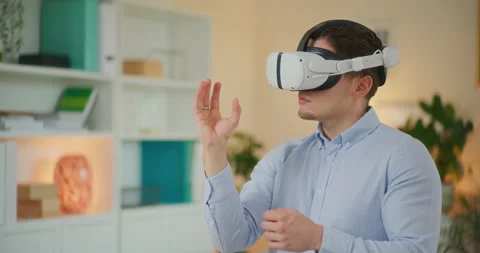 Man Observes in VR Stock Footage 276364665