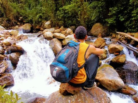 Man observing the river 스톡 사진