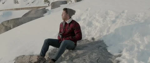 Man Observing Snowy Mountain View Video stock 243741159