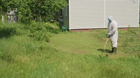 Мan observing two week quarantine because of coronavirus pandemic works 스톡 동영상 132924289