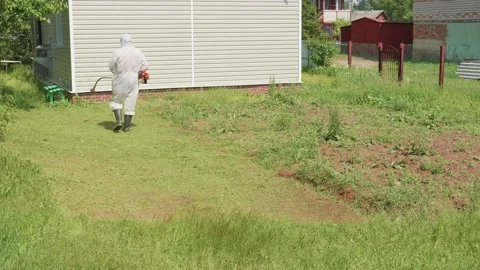 Мan observing two week quarantine because of coronavirus pandemic works 스톡 동영상 132925896