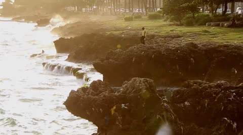 Man by ocean slow motion Stock Footage 26228697