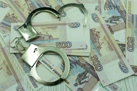 Man offering batch of hundred dollar bills. Hands close up. Venality, bribe,  Stock Photos