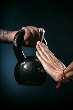 Man offering dumbbell Fotos Stock