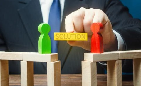 Man offers a solution to end conflict. Compromise dispute resolution. Build b Stock Photos
