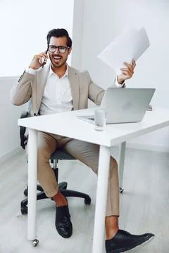 Man office businessman document talk technology phone occupation winner happy Stock Photos