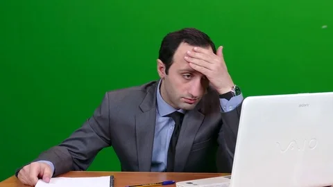 Man in Office To Hot on Green Screen Stock Footage 83734971