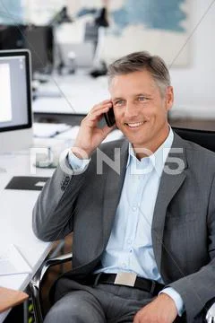 Man In Office Phoning