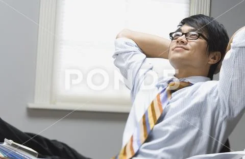 Man in office smiling Stock-Fotos